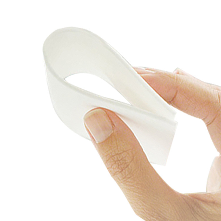 Hand bending a flexible ultra-thin melamine foam sheet